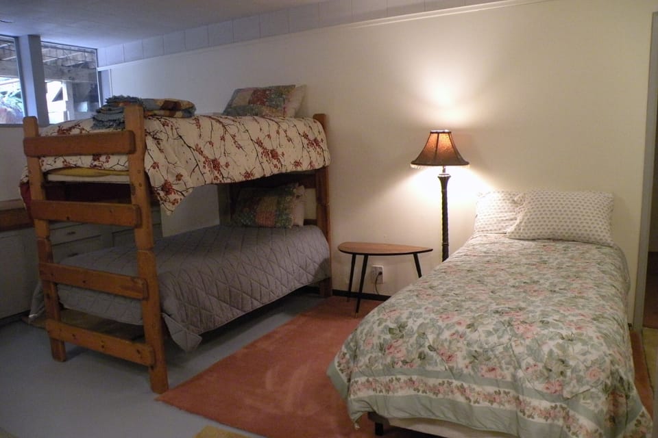 Twin bunk beds and an extra-long twin make this the fun sleeping room.