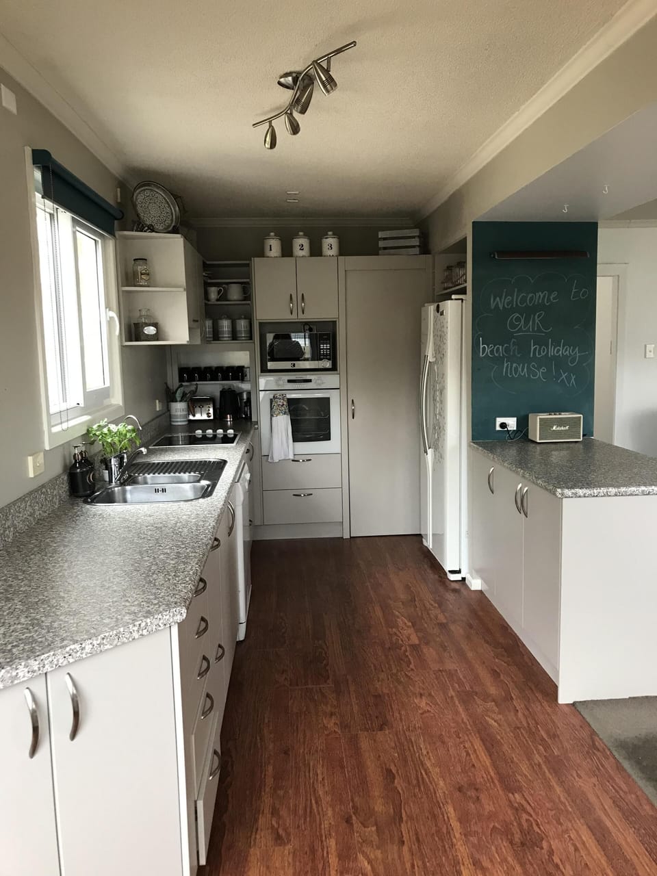 Modern kitchen: 
Includes many appliances as well as standard kitchen essentials