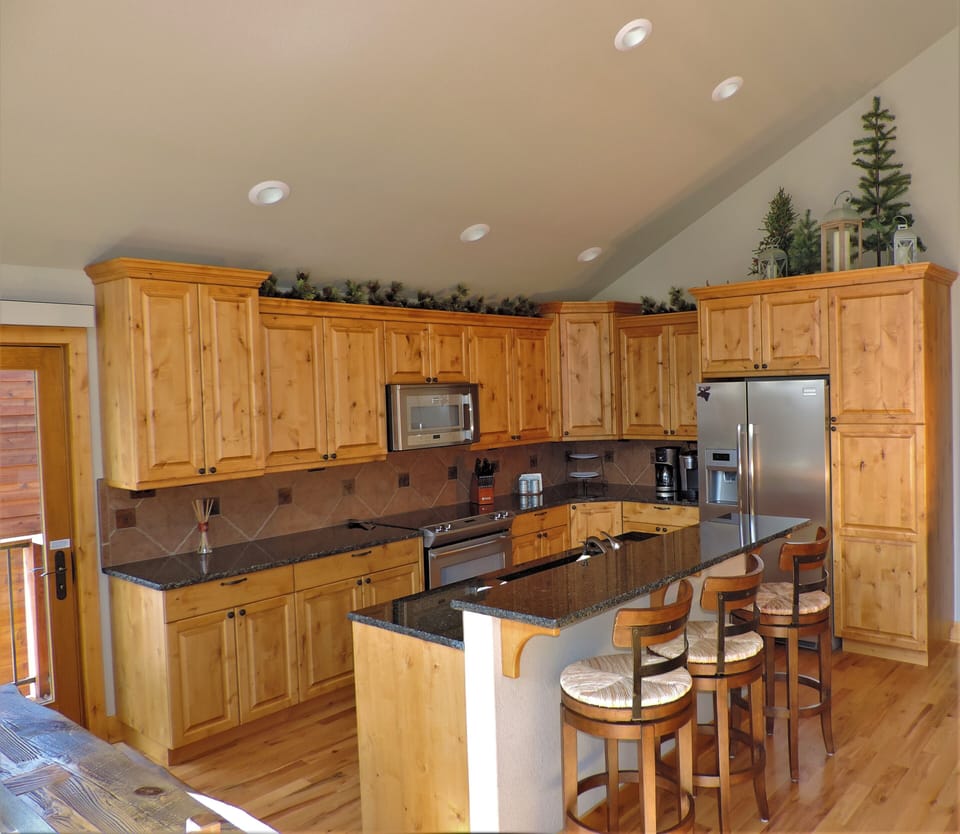 Gourmet kitchen with breakfast bar seating