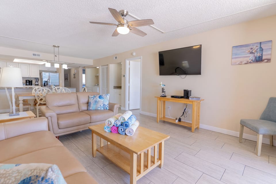 Living room with flatscreen TV Overlooking the ocean and kitchen