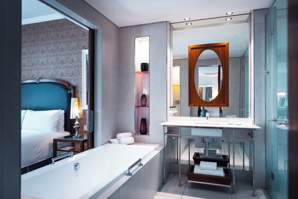 Separate tub and shower, deep soaking tub, designer toiletries