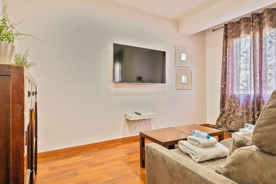 Apartment, 2 Bedrooms | Living area | Flat-screen TV