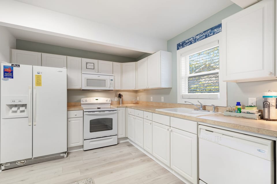 Open kitchen area with plenty of counter space to accommodate your cooking needs