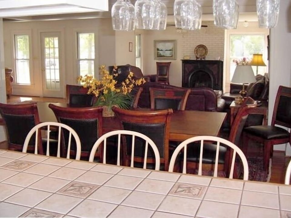 Dining room with new furniture & part of living room with new leather furniture