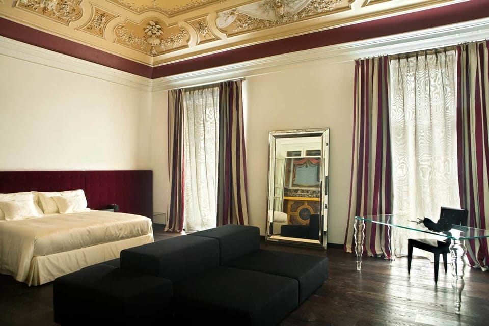 Luxury Suite, City View | Minibar, in-room safe, individually decorated, individually furnished