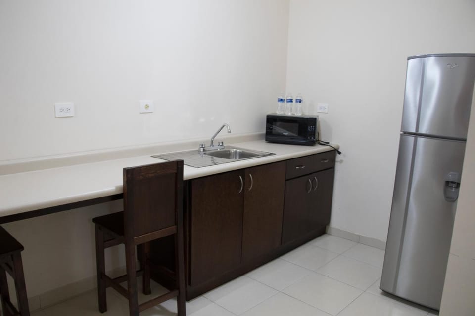 Fridge, microwave, cookware/dishes/utensils