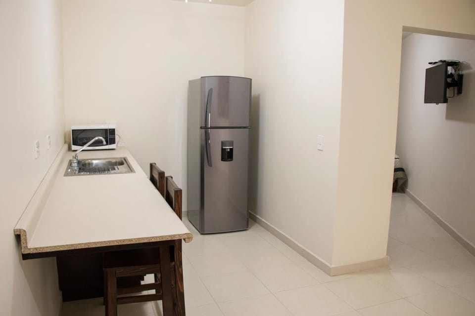 Fridge, microwave, cookware/dishes/utensils