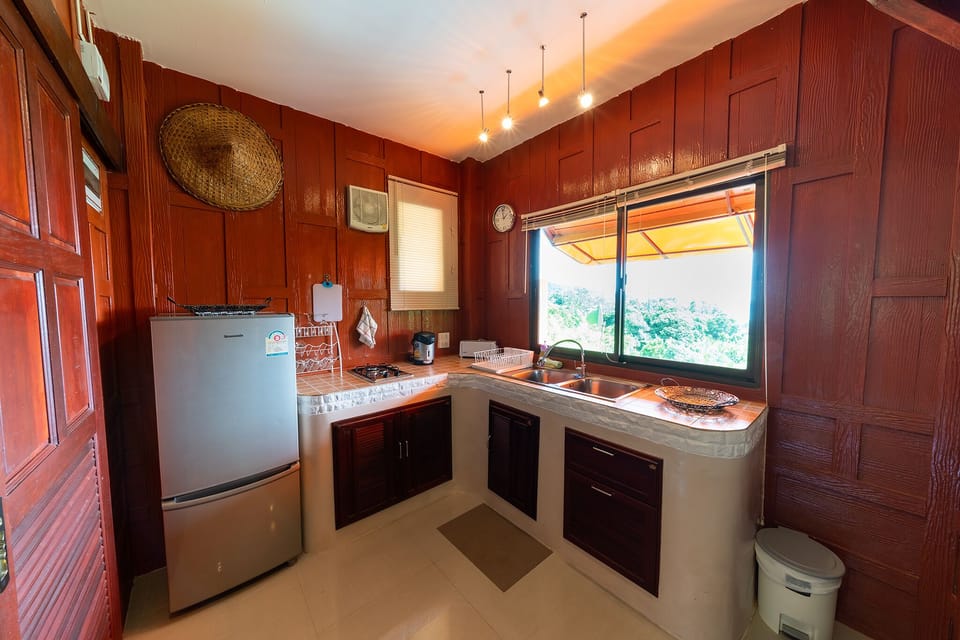 2nd floor's kitchenette, connecting to the living area and the two bedrooms