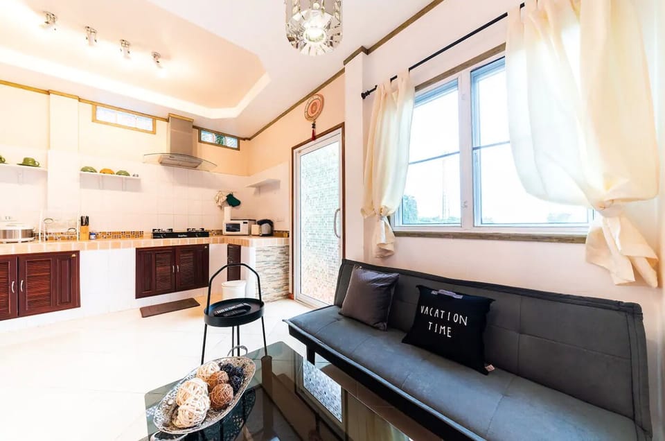 1st floor's living area with a convertible sofa bed for extra guest