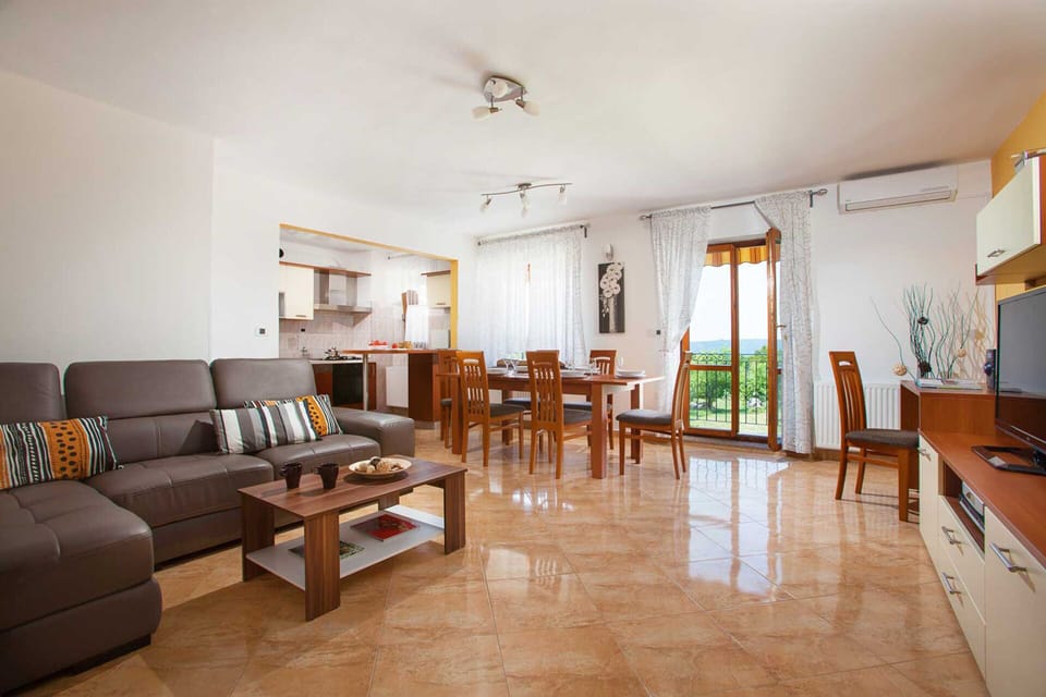Comfortable living space with large windows overlooking the nature