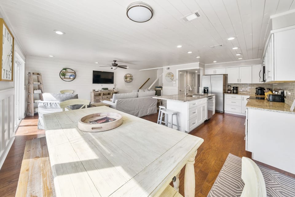 Relax in your bright, open-concept living space where kitchen, dining, and lounge areas flow seamlessly together for perfect group gatherings.