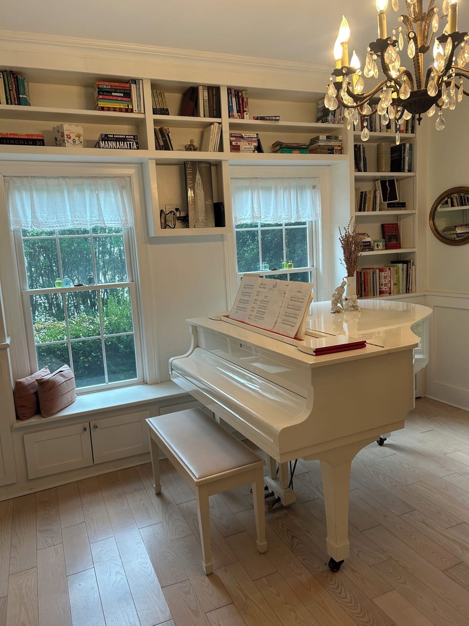 sitting room with a grand piano