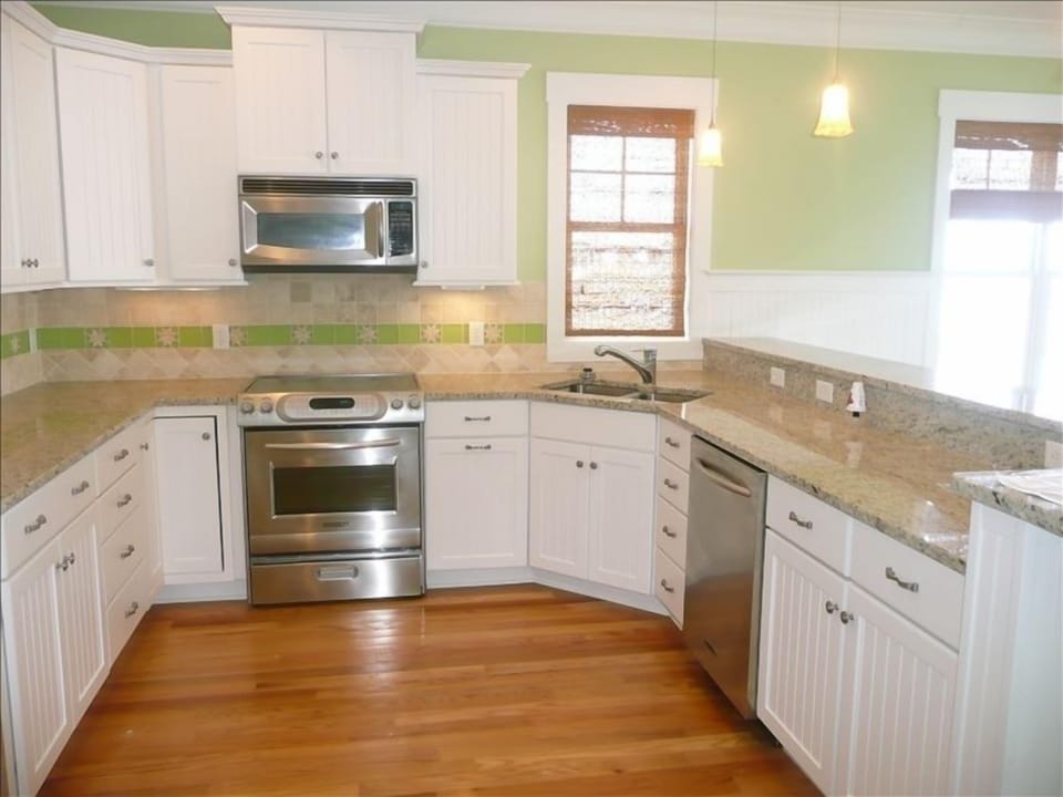 The upgraded appliances and granite counters are pristine.