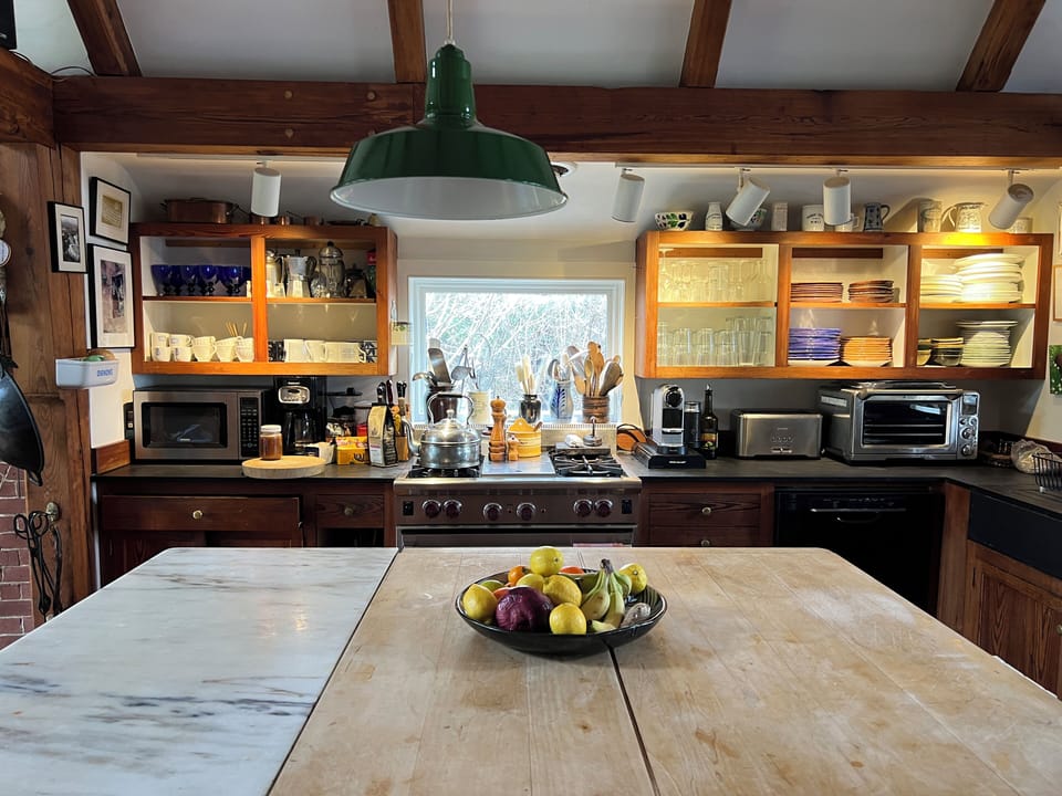 kitchen island with marble slab for pastry