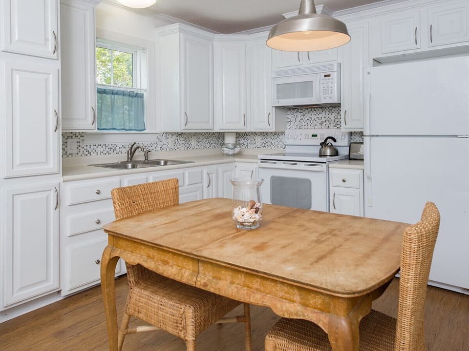 Open kitchen offers plenty of cabinet space