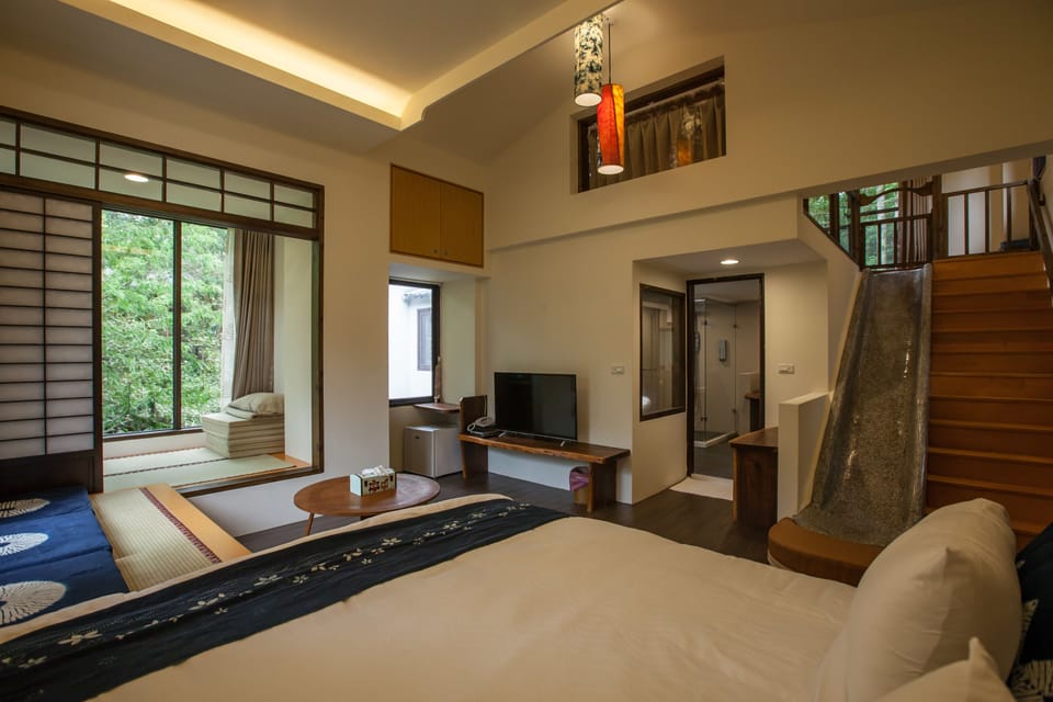 Luxury Quadruple Room | Living area | 30-inch flat-screen TV with cable channels