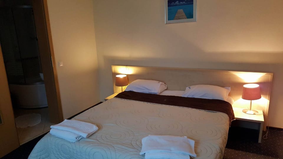 Premium bedding, down comforters, memory foam beds, desk