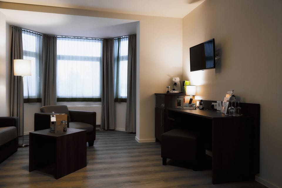 Superior Apartment | Living area | Flat-screen TV, offices