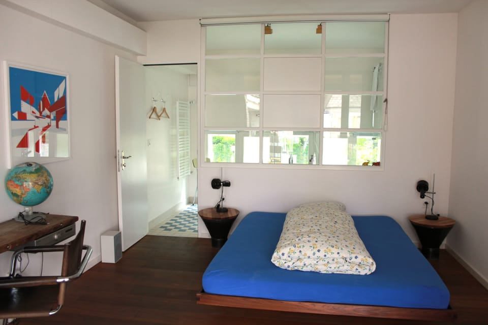 Individually decorated, individually furnished, desk, rollaway beds