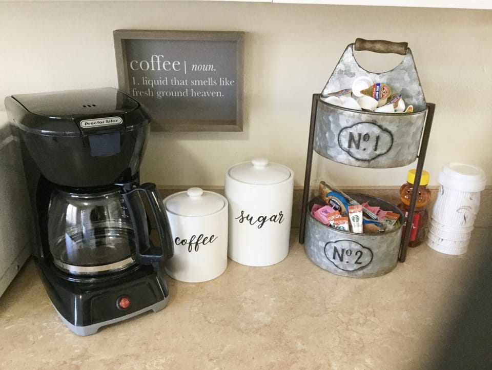 Coffee, anyone? We provide coffee and condiments, even to-go cups.