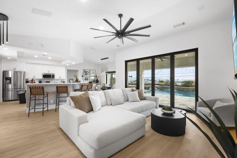 Living Room: This sun-drenched space is the ultimate setting for sophisticated Sunday brunches.