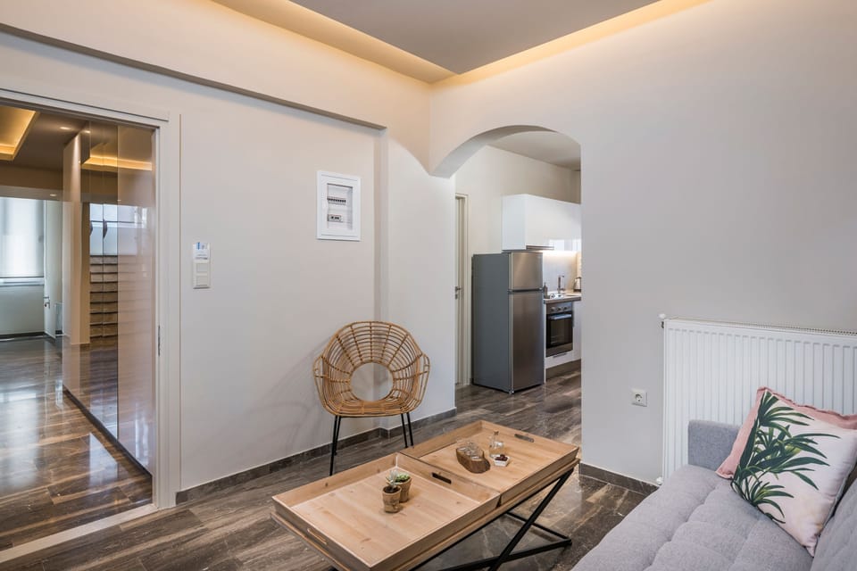 Deluxe Apartment, 2 Bedrooms, Jetted Tub | Living area | 32-inch flat-screen TV with satellite channels, TV