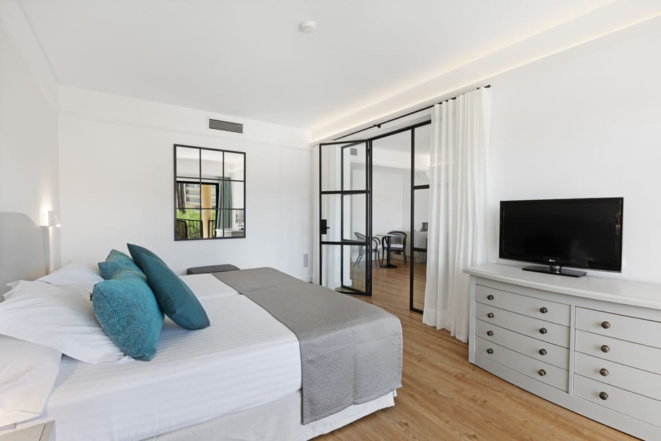 Suite, Terrace, Pool View | Minibar, in-room safe, desk, blackout drapes