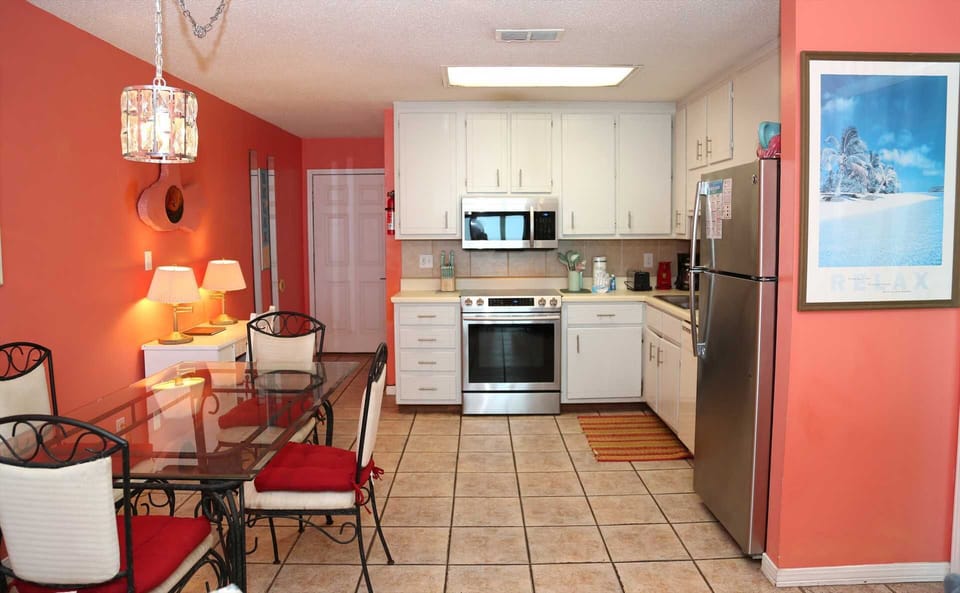 The fully equipped kitchen is stocked with essentials for cooking in.