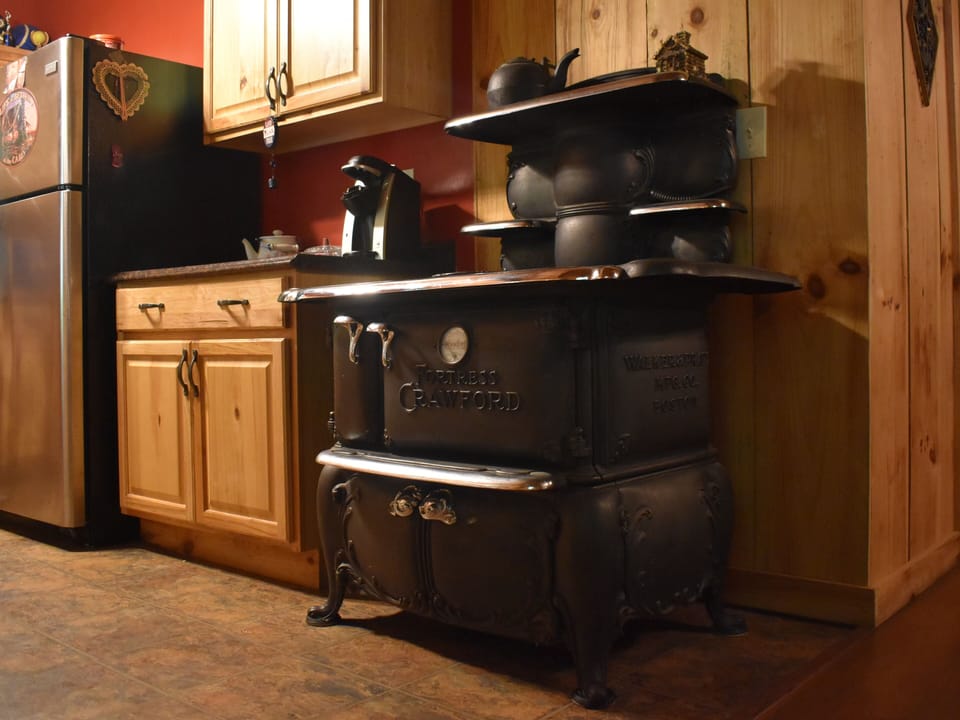 Antique cooking stove as part of the décor. Not functional.