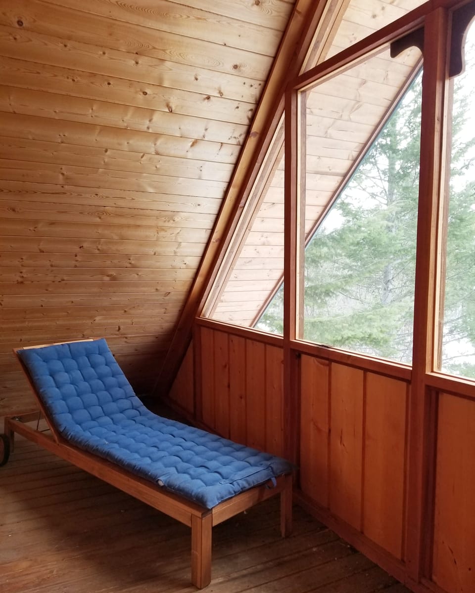In the screened in balcony off of the bedroom.