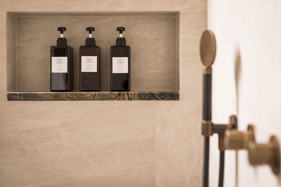 Shower, rainfall showerhead, eco-friendly toiletries, hair dryer