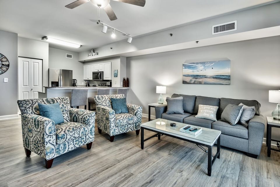 New chairs and pull out couch in the living room with gorgeous decorations.