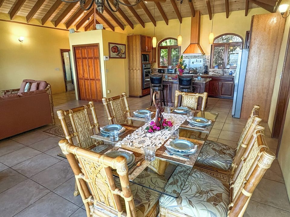 The dining area looking towards the kitchen and living room