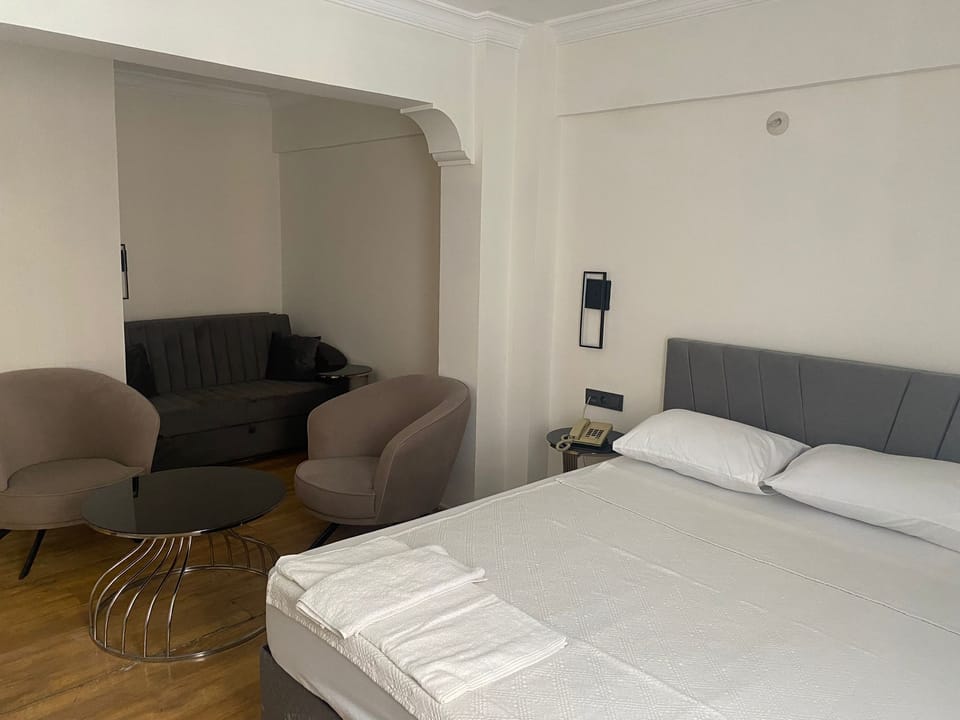 Deluxe Triple Room | Desk, iron/ironing board (on request)