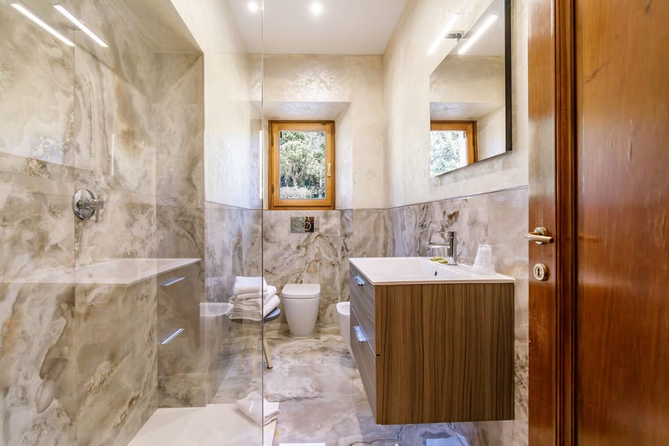 Junior Suite, Multiple Beds, Garden View | Bathroom | Free toiletries, hair dryer, bidet, towels