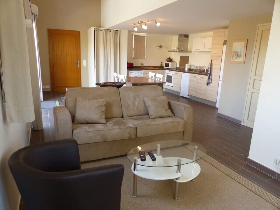 Living room with sofa bed 140 cm wide, satellite TV.
