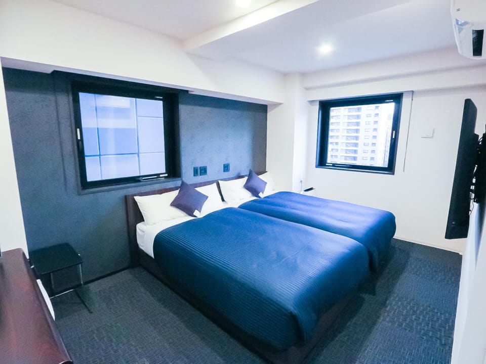 Desk, laptop workspace, free WiFi, bed sheets