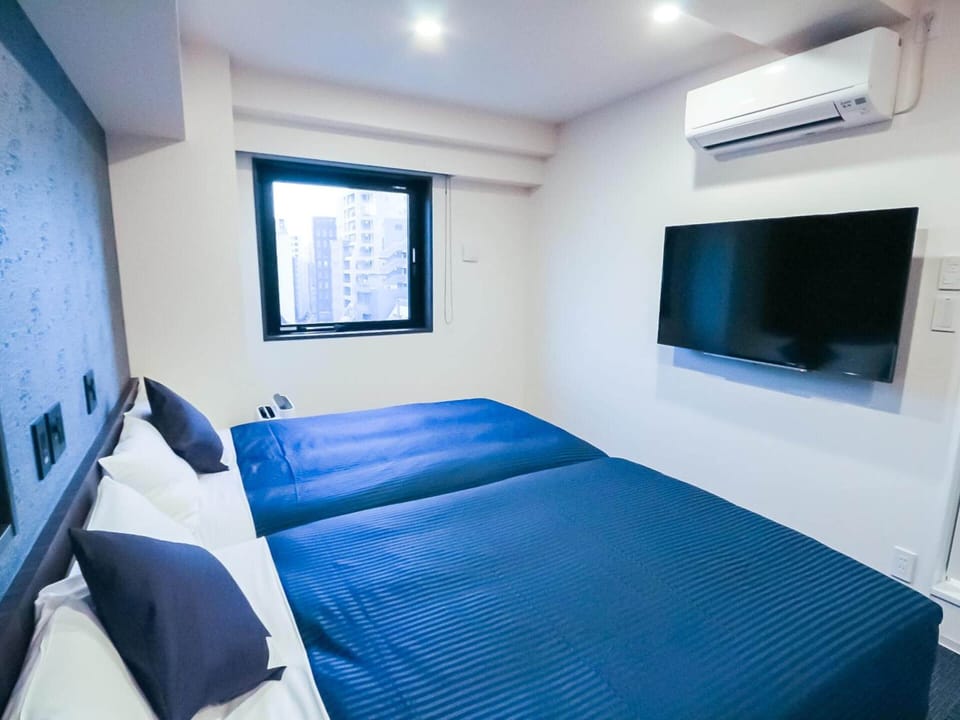 Desk, laptop workspace, free WiFi, bed sheets