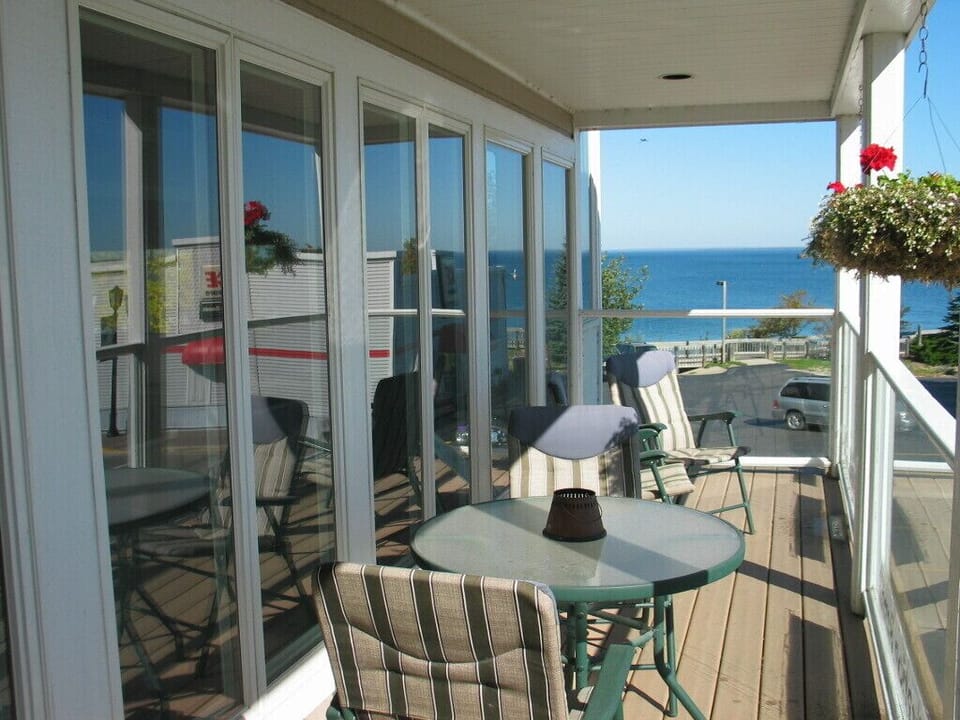 Private balcony downtown St. Ignace overlooking the Straits of Mackinac, Lake Huron, Moran Bay