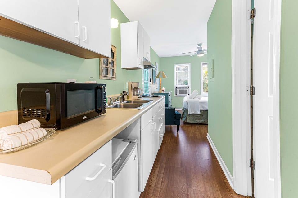 Kitchenette leading to queen bedroom 1 on the main living level