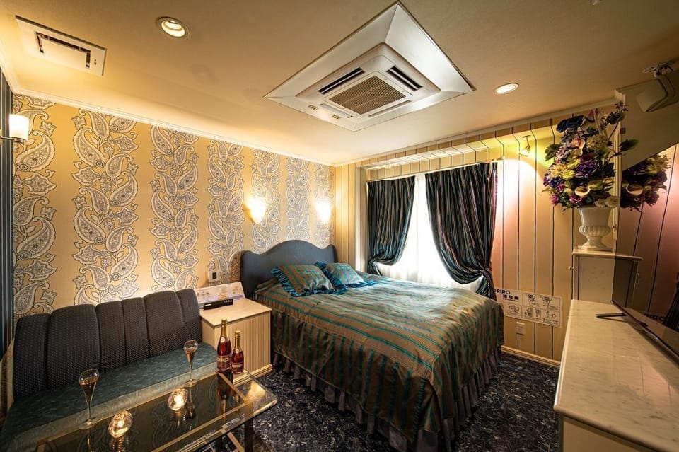 Economy Room | Down comforters, blackout drapes, free WiFi, bed sheets