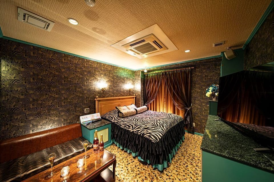 Economy Room | Down comforters, blackout drapes, free WiFi, bed sheets