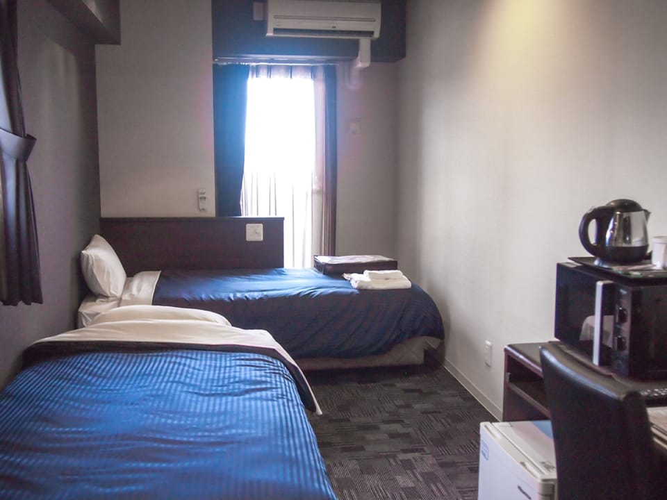 Desk, laptop workspace, free WiFi, bed sheets