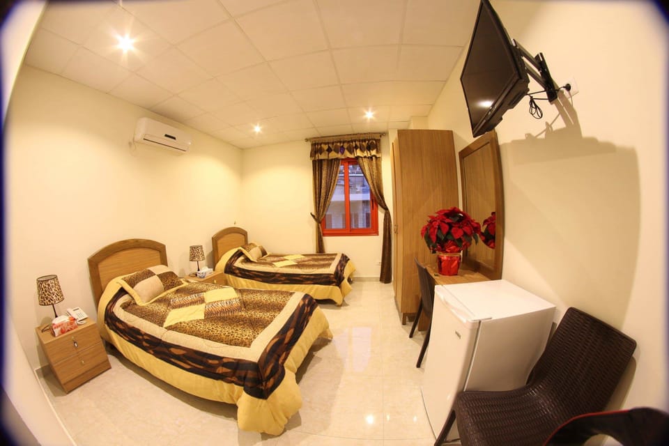 Twin Room | In-room safe, desk, blackout drapes, soundproofing