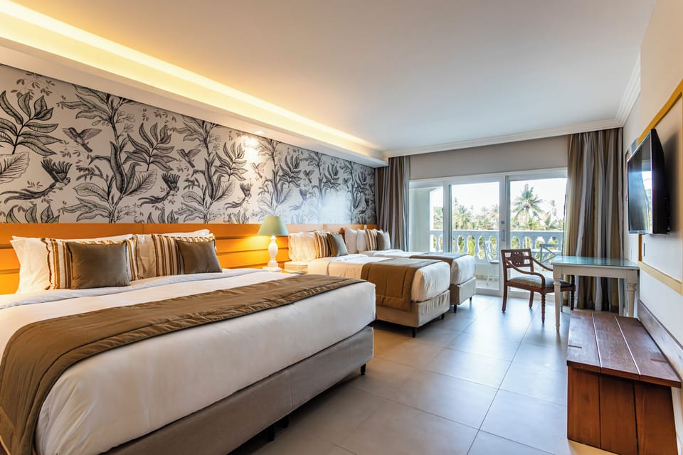 Premium bedding, minibar (some free items), in-room safe, desk