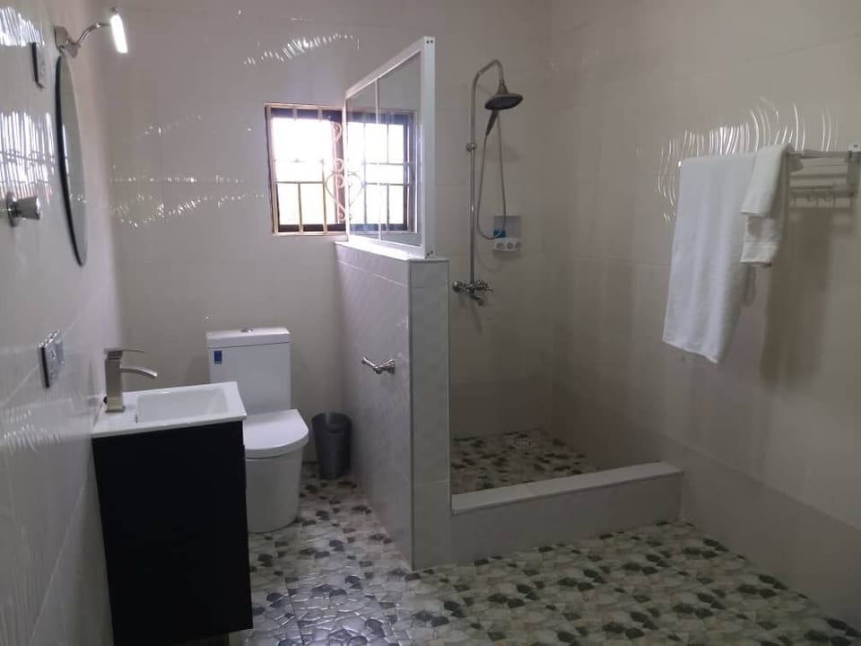 Comfort Room | Bathroom | Shower, rainfall showerhead, free toiletries, slippers