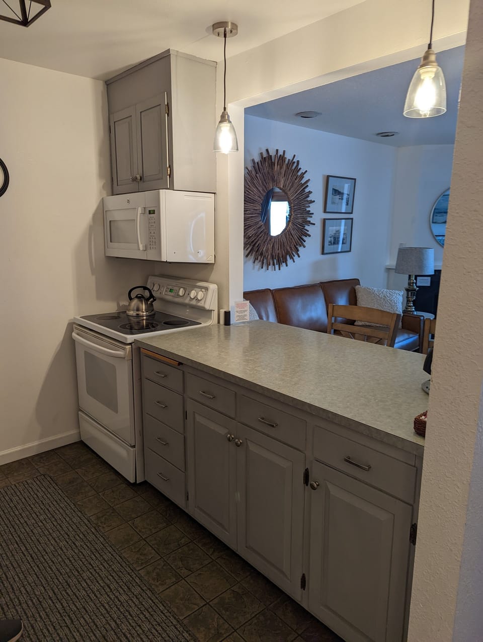 Townhouse | Private kitchen | Full-size fridge, microwave, oven, stovetop