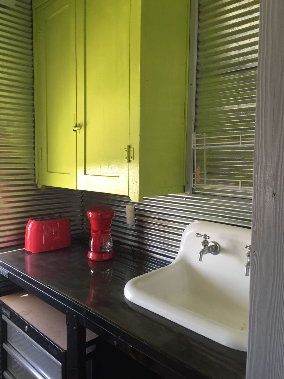 The kitchen with its original sink. 