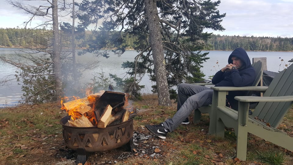Fire Ring with Adirondack chairs and Picnic Table for outside dining.