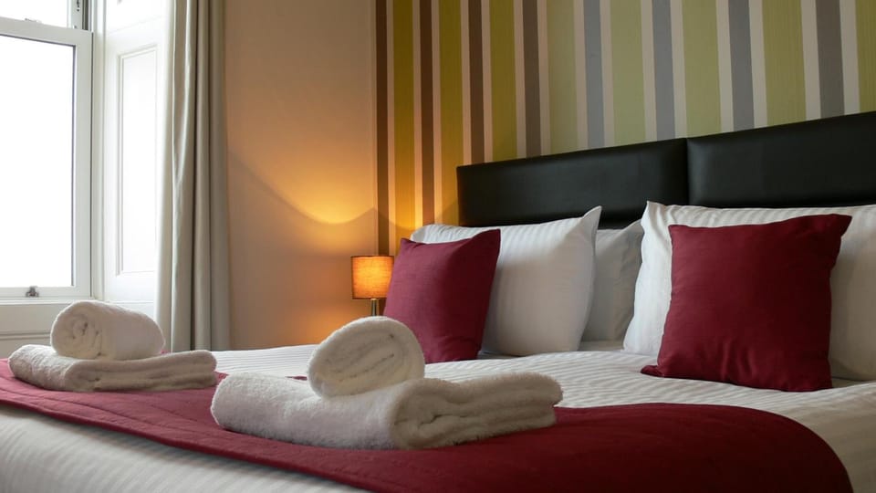 In-room safe, desk, WiFi (free), bed sheets
